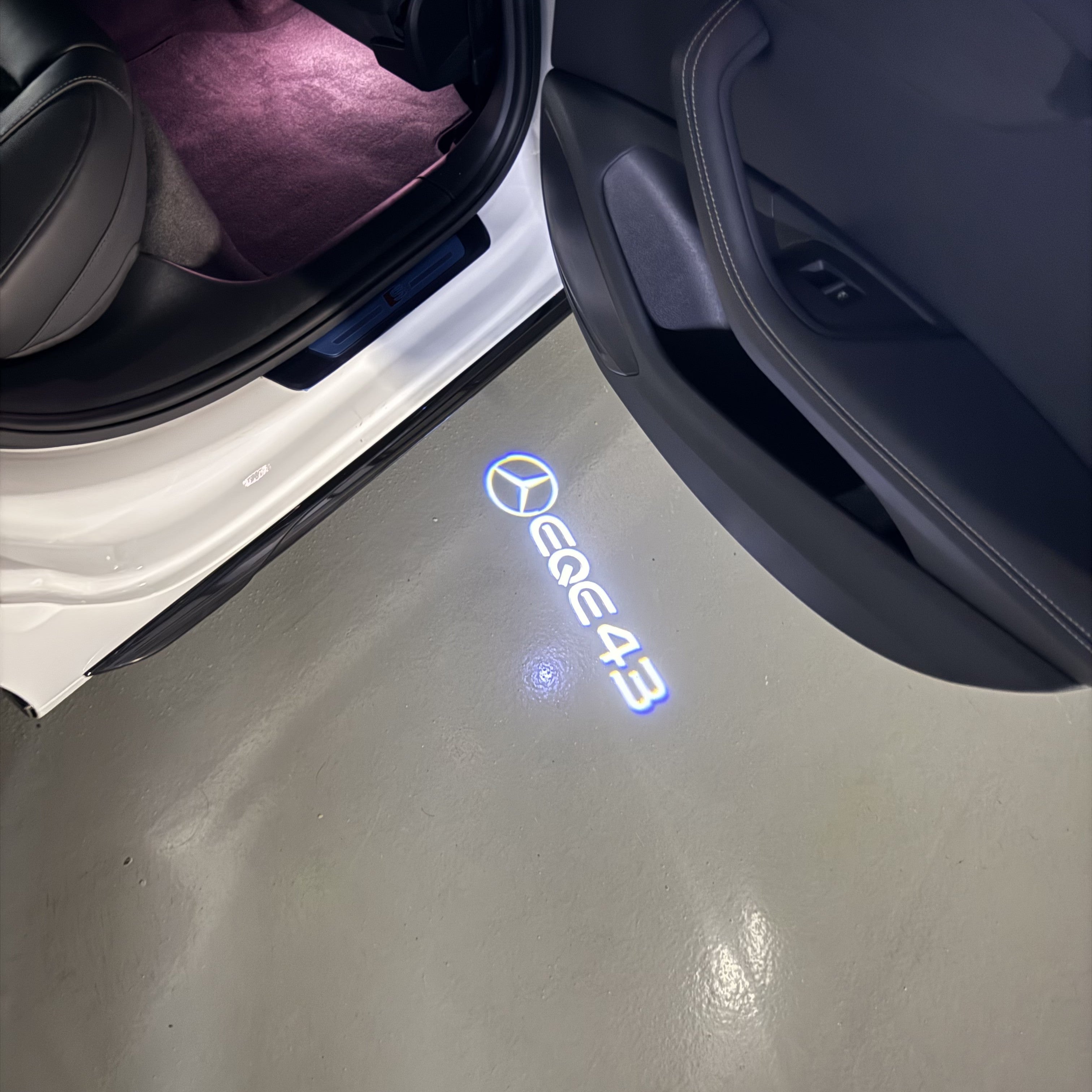 MERCEDES BENZ EQE 43 LOGO PROJECTOT LIGHTS  (quantity 1 = 1 set /2 door lights with 2 logo films)Nr.02M179