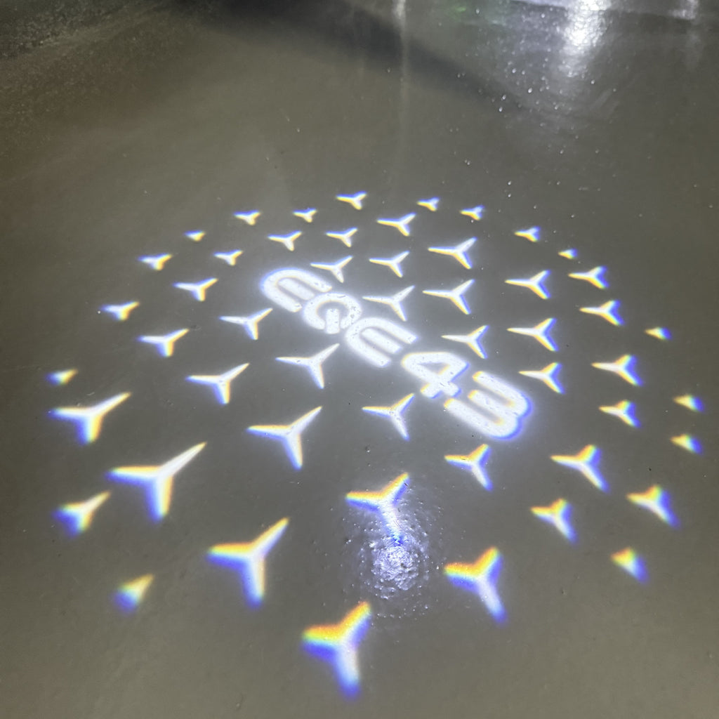 MERCEDES BENZ EQE 43 LOGO PROJECTOT LIGHTS  (quantity 1 = 1 set /2 door lights with 2 logo films)Nr.02M169