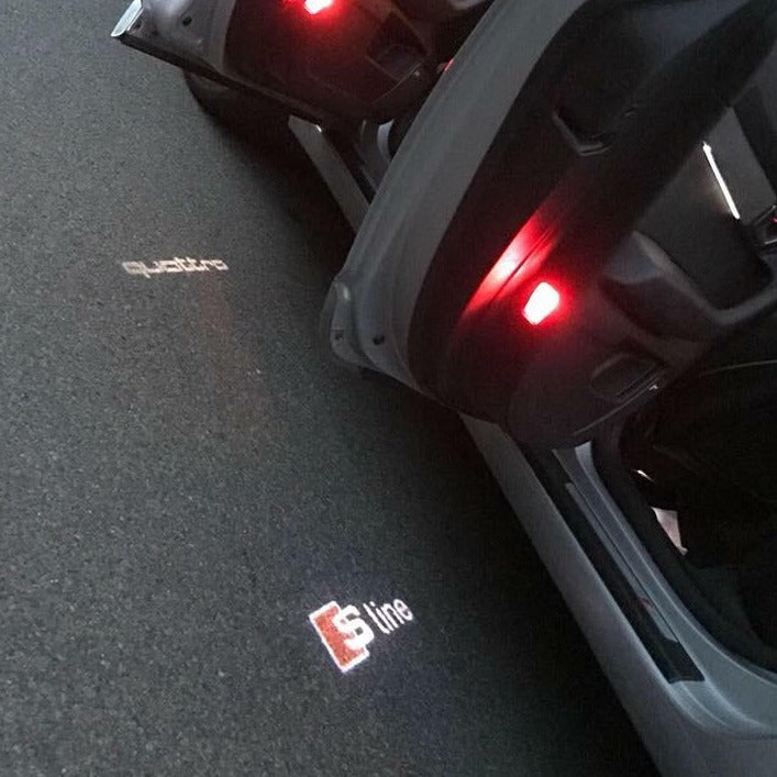 AUDI  S LINE LOGO PROJECTOT LIGHTS Nr.100  (quantity 1 = 2 Logo Films /2 door lights）