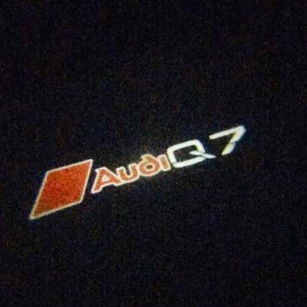 AUDI Q7 LOGO PROJECTOT LIGHTS Nr.82 (quantità 1 = 2 pellicole logo /2 luci porta） 