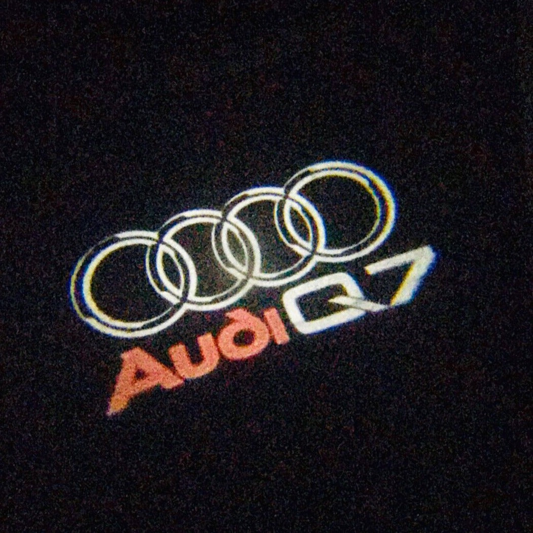 AUDI Q7 LOGO PROJECTOT LIGHTS Nr.49  (quantity 1 = 2 Logo Films /2 door lights）