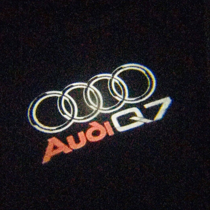 AUDI Q7 LOGO PROJECTOT LIGHTS Nr.49 (quantità 1 = 2 pellicole logo /2 luci porta） 