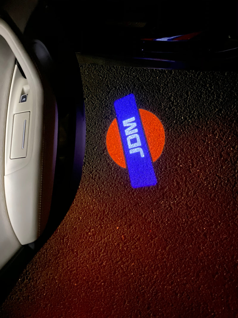 JDM LOGO PROJECTOT LIGHTS Nr.15 (quantità 1 = 1 set/2 luci per porta) 