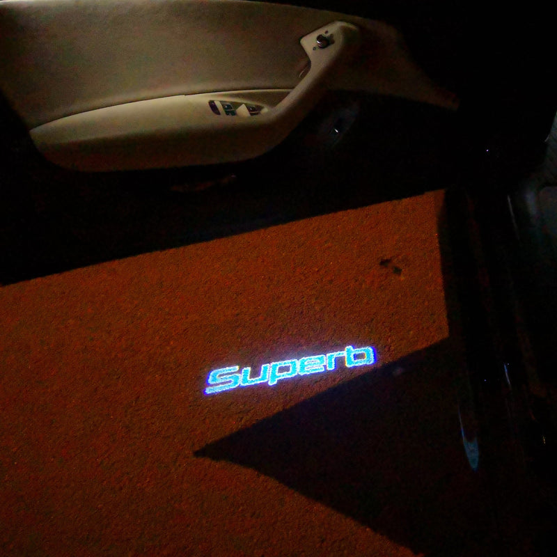 SKODA SUPERB LOGO PROJECTOT LIGHTS Nr.93 (quantità 1 = 2 pellicole logo / 2 luci porta)