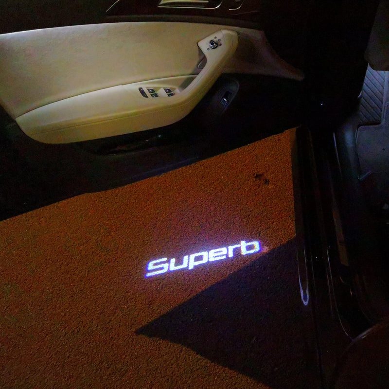 SKODA SUPERB LOGO PROJECTOT LIGHTS Nr.92 (quantità 1 = 2 pellicole logo / 2 luci porta)