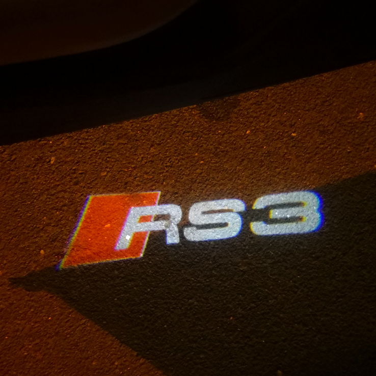 AUDI RS3 LOGO PROJECTOT LIGHTS Nr.52 (quantità 1 = 2 pellicole logo /2 luci porta） 