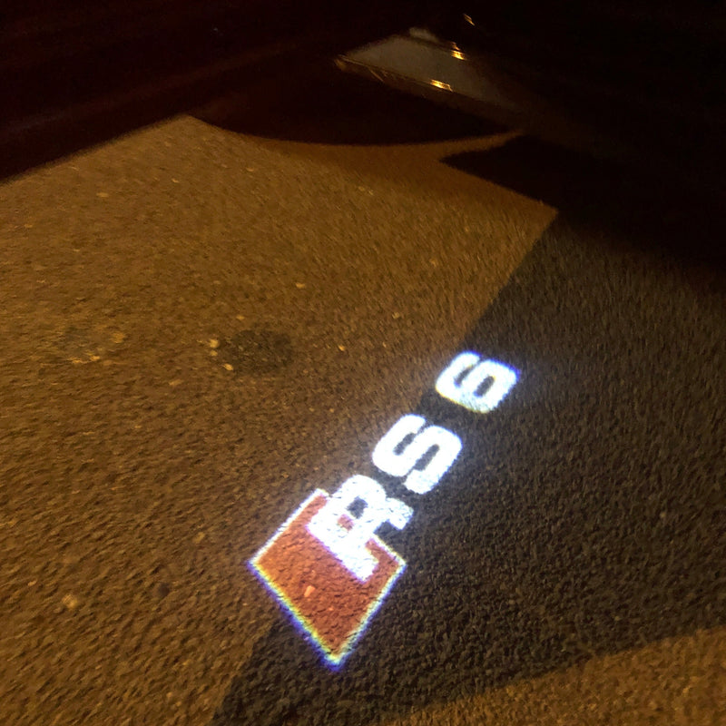 AUDI RS6 LOGO PROJECTOT LIGHTS Nr.55 (quantità 1 = 2 pellicole logo /2 luci porta） 