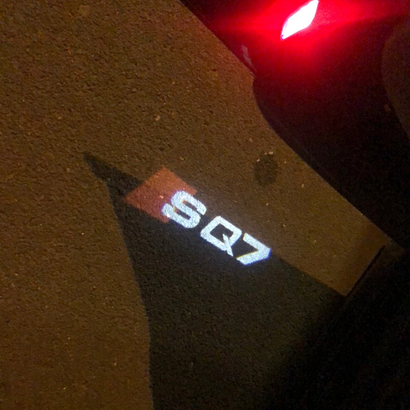 AUDI SQ7 LOGO PROJECTOT LIGHTS Nr.59 (quantità 1 = 2 pellicole logo /2 luci porta） 