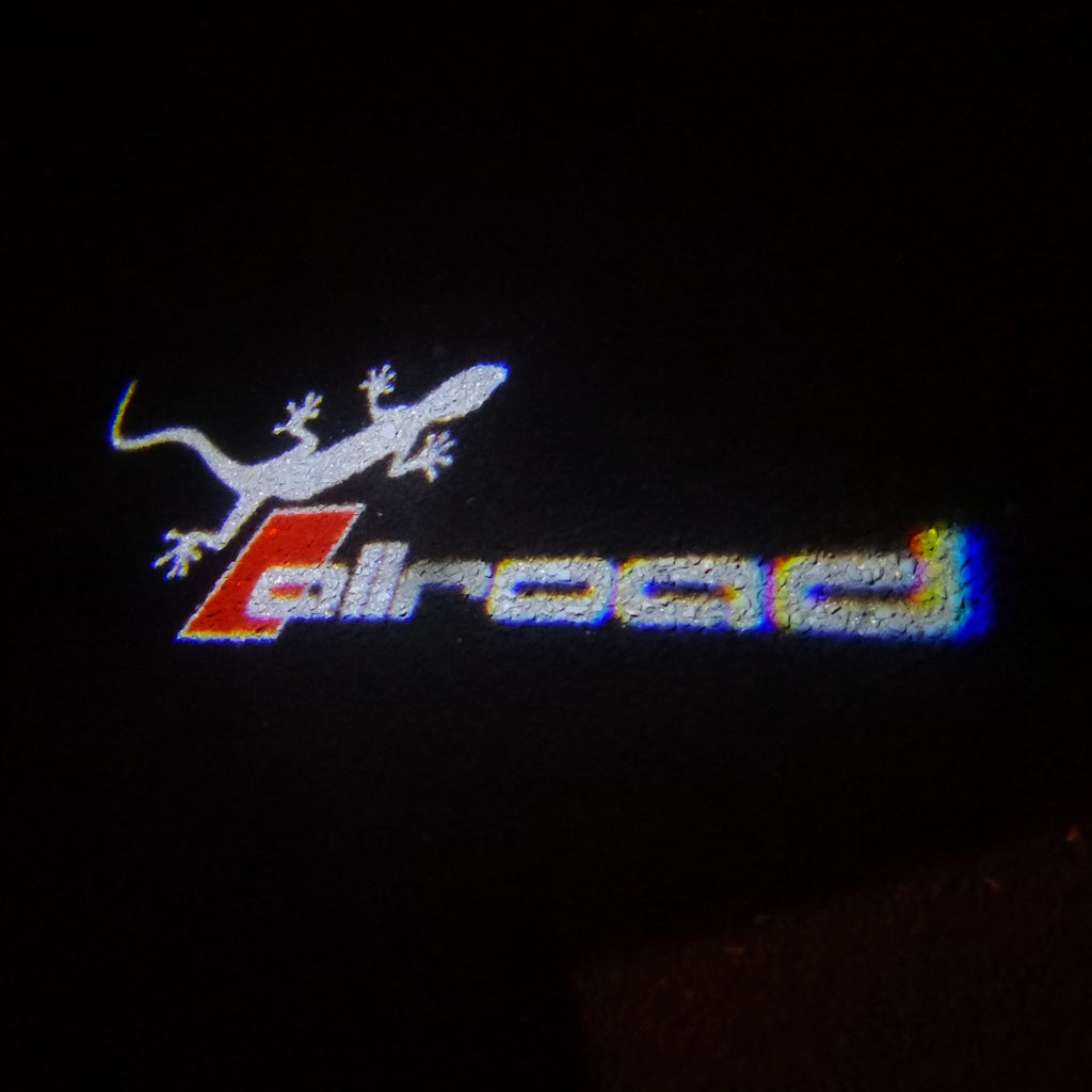 AUDI ALLROAD  LOGO PROJECTOT LIGHTS Nr.147  (quantity 1 = 2 Logo Films & 2 door lights）