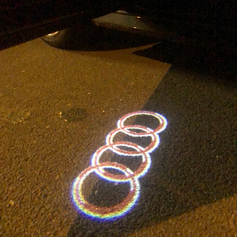 AUDI 4 RINGS LOGO PROJECTOT LIGHTS Nr.143 (Menge 1 = 2 Logofolien /2 Türleuchten) 