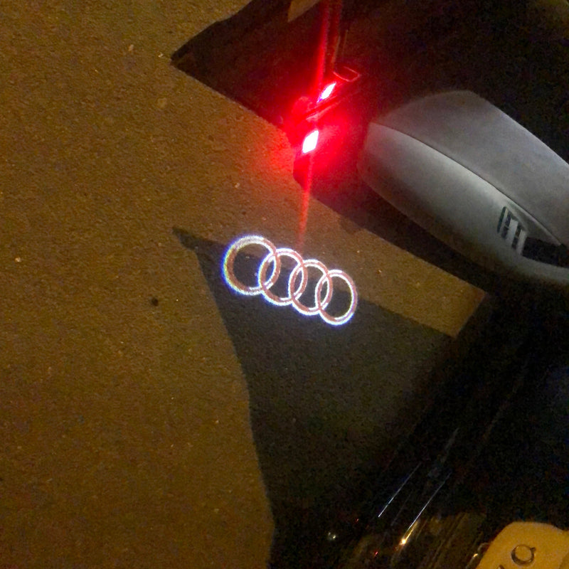 AUDI 4 RINGS LOGO PROJECTOT LIGHTS Nr.143 (Menge 1 = 2 Logofolien /2 Türleuchten) 