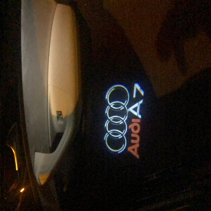 AUDI A7 LOGO PROJECTOT LIGHTS Nr.45 (quantità 1 = 2 pellicole logo /2 luci porta） 