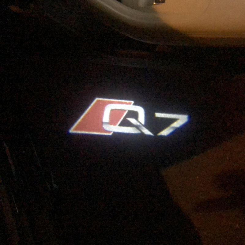 AUDI Q7 LOGO PROJECTOT LIGHTS Nr.79 (quantità 1 = 2 pellicole logo /2 luci porta） 