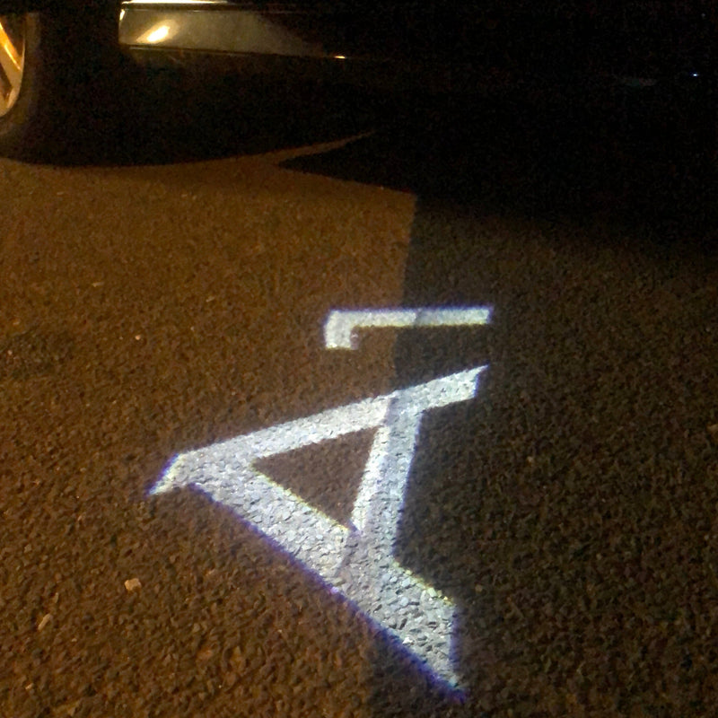 AUDI A1 LOGO PROJECTOT LIGHTS Nr.169 (quantità 1 = 2 pellicole logo /2 luci porta） 