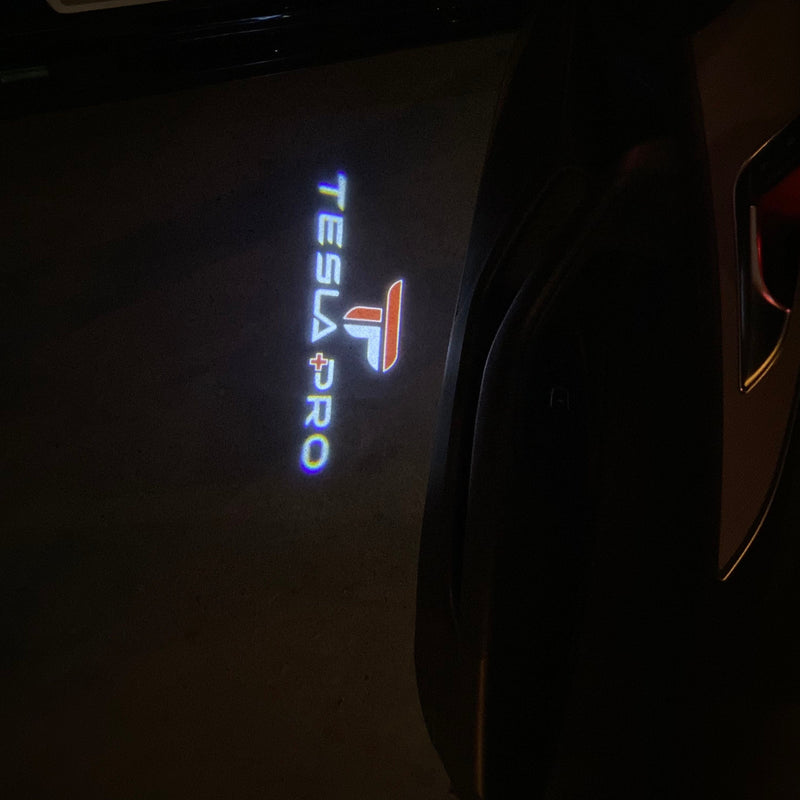 TESLA PRO LOGO PROJECROTR LIGHTS Nr.1530 (quantità 1 = 2 pellicole logo / 2 luci porta)