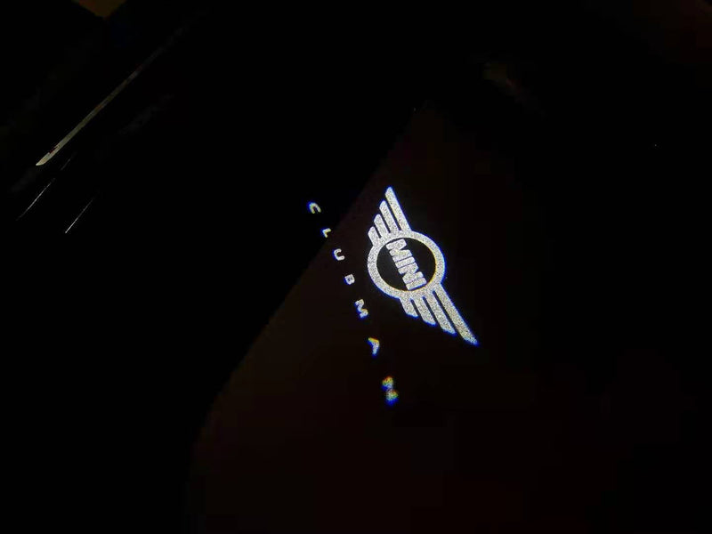 MINI CLUBMAN LOGO PROJECROTR LIGHTS Nr.137 (Menge 1 = 2 Logofolie / 2 Türleuchten) 