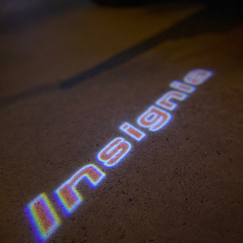 Opel Insignia LOGO PROJECROTR LIGHTS originale Nr.1440 (quantità 1 = 1 set/2 luci porta)