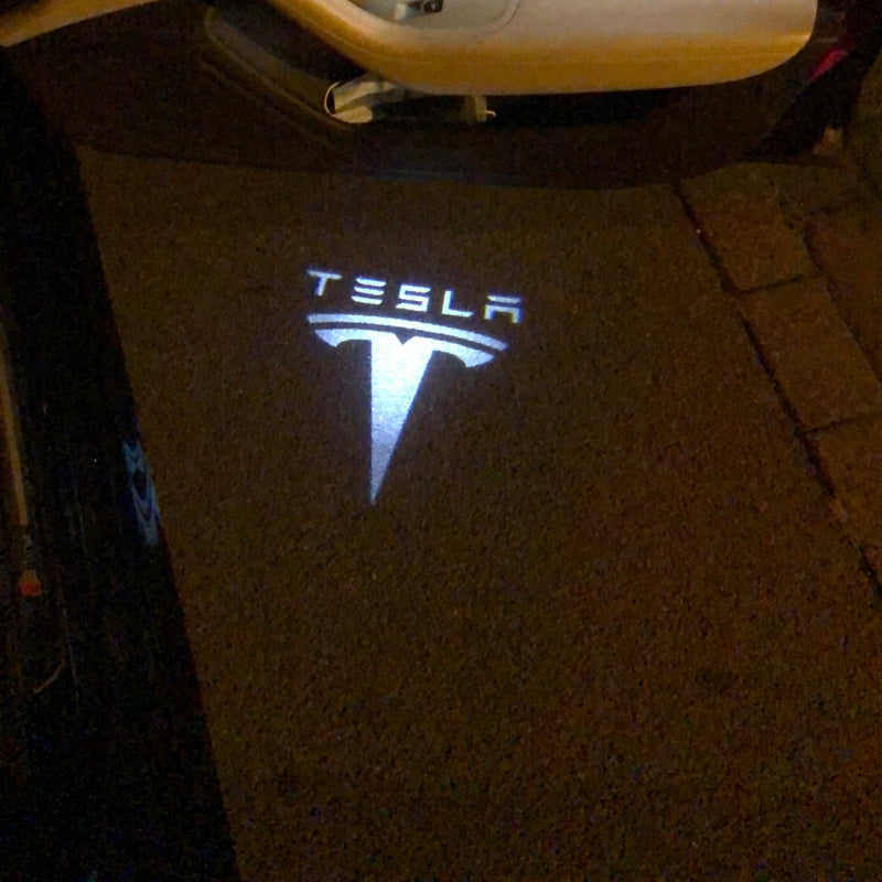 TESLA LOGO PROJECROTR LIGHTS Nr.1510 (quantità 1 = 2 pellicole logo / 2 luci per porta)