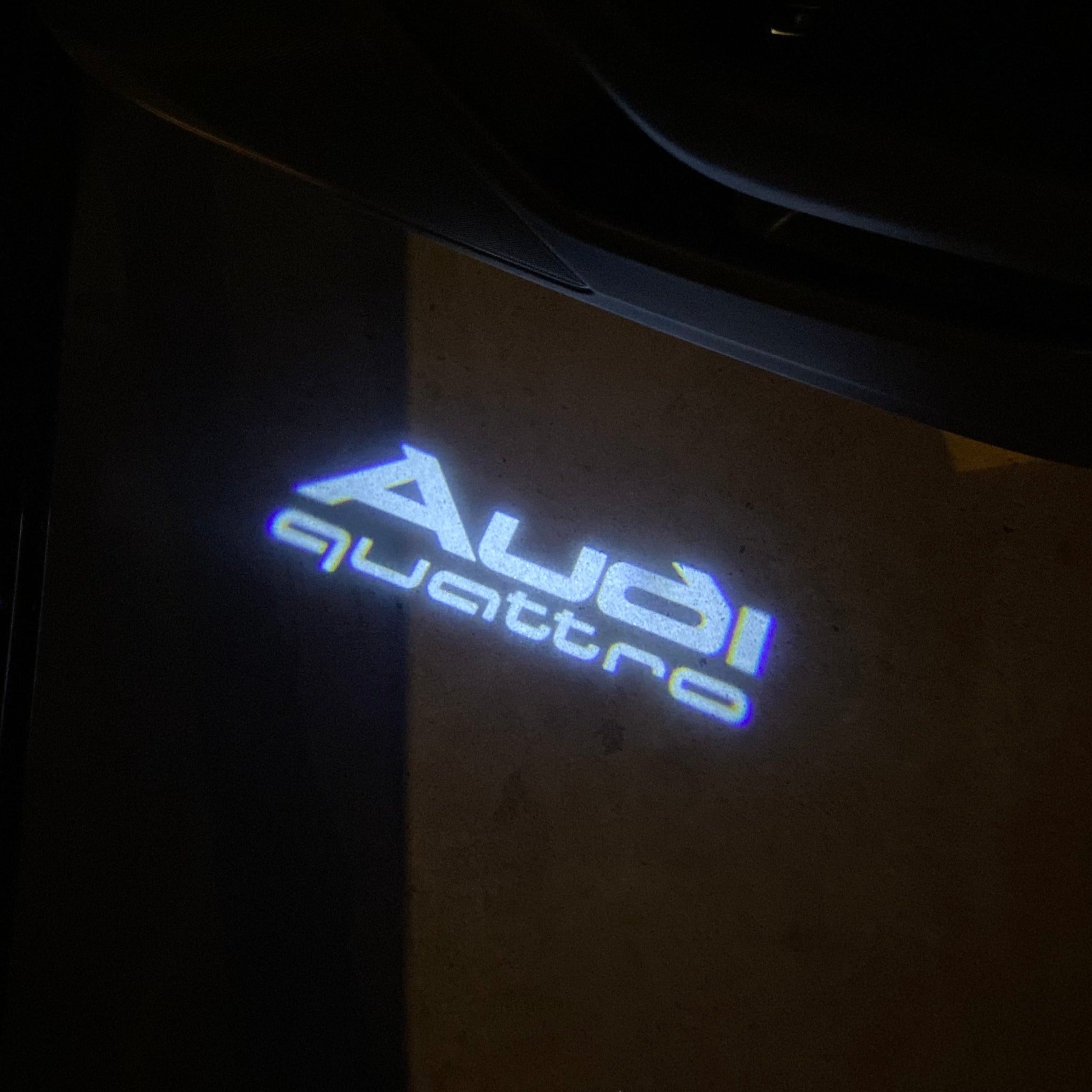AUDI QUATTRO LOGO PROJECTOT LIGHTS Nr.958   (quantity 1 = 2 Logo Films /2 door lights）