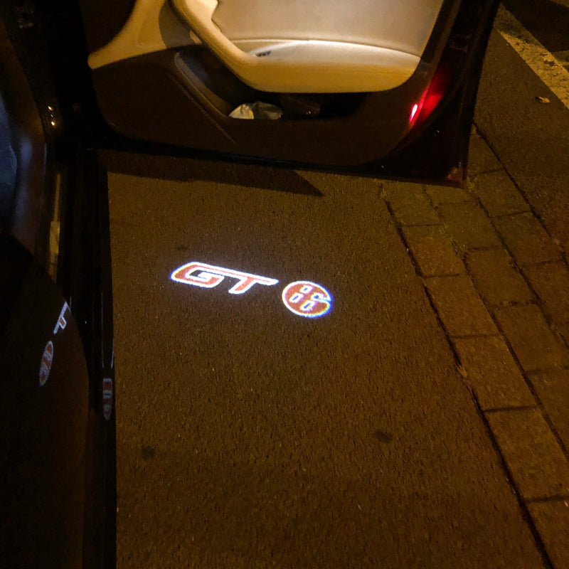 GT 86 LOGO PROJECTOT LIGHTS Nr.06 (quantità 1 = 2 pellicole logo /2 luci porta）