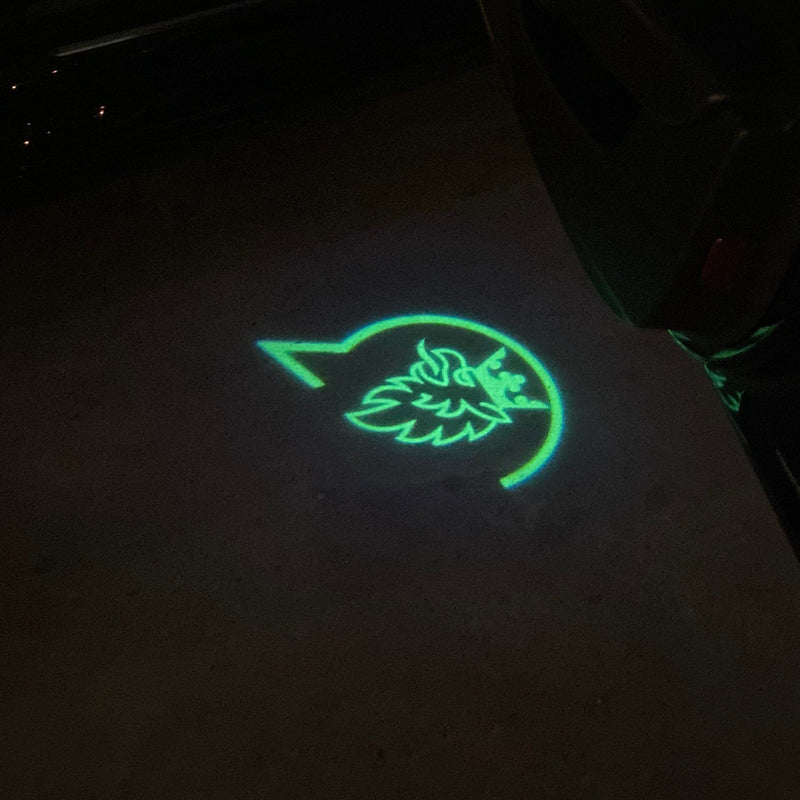 SAAB Original LOGO PROJECROTR LIGHTS Nr.2517 (Menge 1 = 1 Satz/2 Türleuchten)