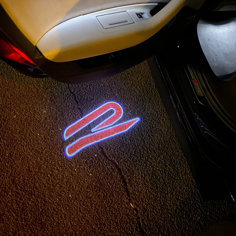 Volkswagen Luci porta R Logo Nr. 155 (quantità 1 = 2 pellicole logo / 2 luci porta)