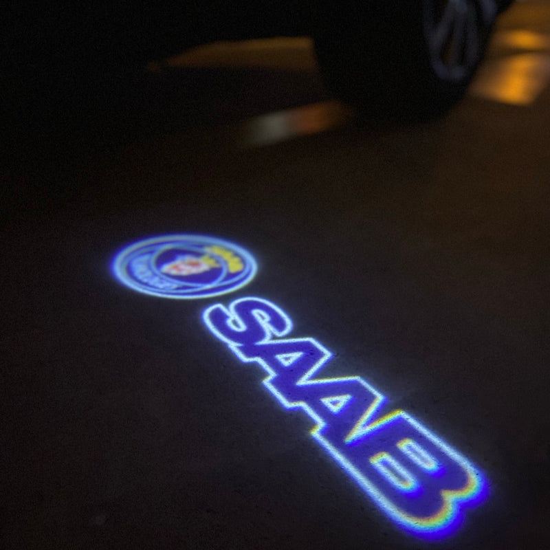 SAAB Original LOGO PROJECROTR LIGHTS Nr.2515 (quantità 1 = 1 set/2 luci porta)