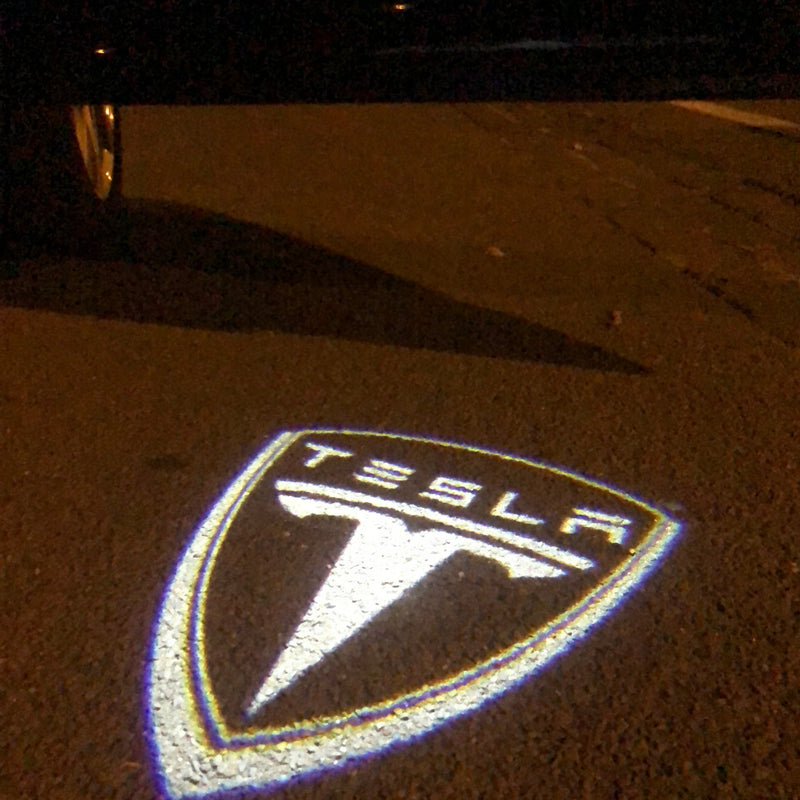 TESLA LOGO PROJECROTR LIGHTS Nr.1506 (quantità 1 = 2 pellicole logo / 2 luci porta)