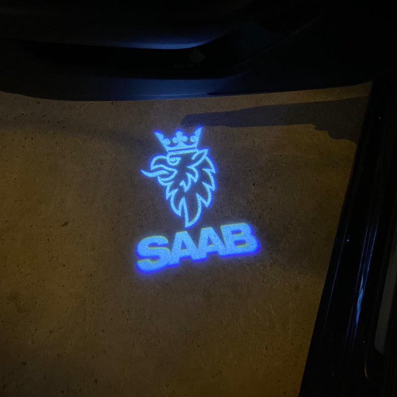 SAAB Original LOGO PROJECROTR LIGHTS Nr.2518 (quantità 1 = 1 set/2 luci porta)