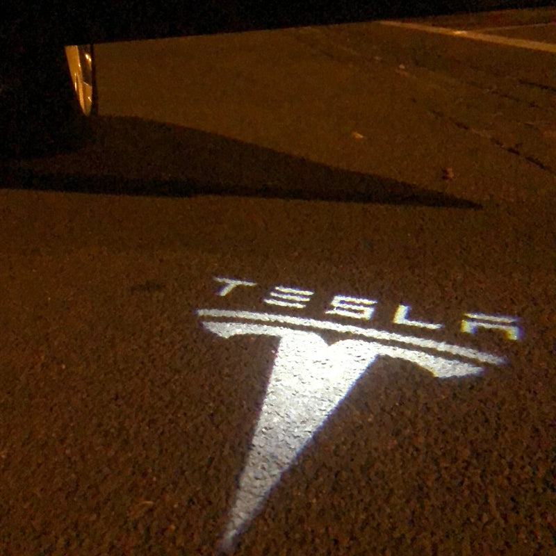 TESLA LOGO PROJECROTR LIGHTS Nr.1510 (quantità 1 = 2 pellicole logo / 2 luci per porta)