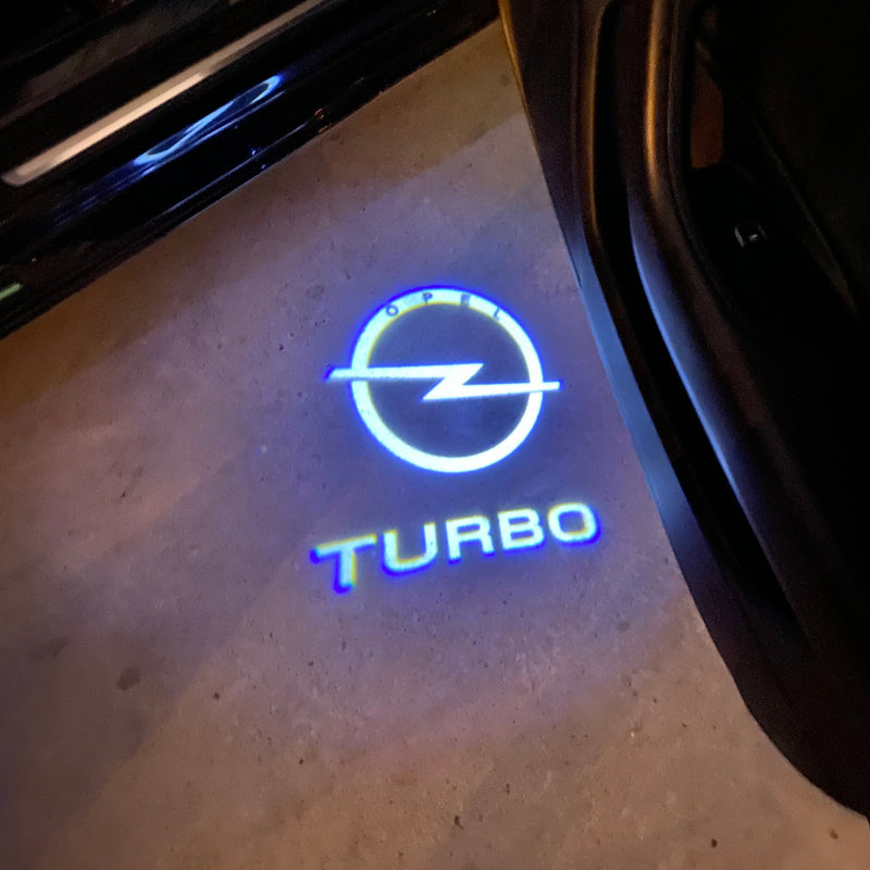 Opel Insignia TURBO LOGO PROJECROTR LIGHTS Nr.1432 (quantità 1 = 1 set/2 luci porta)