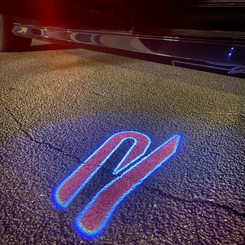 Volkswagen Luci porta R Logo Nr. 155 (quantità 1 = 2 pellicole logo / 2 luci porta)