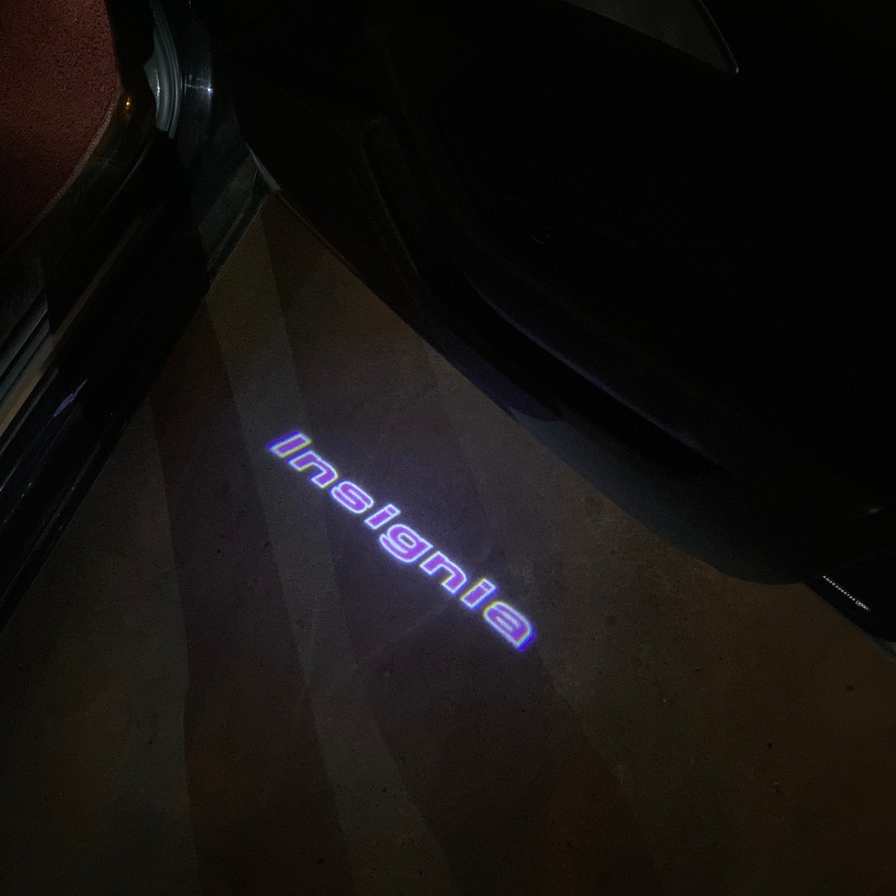 Opel Insignia Original  LOGO PROJECROTR LIGHTS Nr.1410 (quantity 1 = 1 sets/2 door lights)