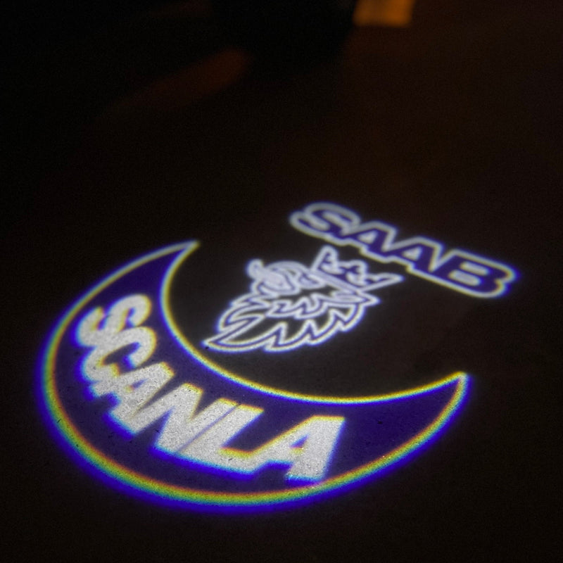 SAAB Original LOGO PROJECROTR LIGHTS Nr.2512 (quantità 1 = 1 set/2 luci porta)