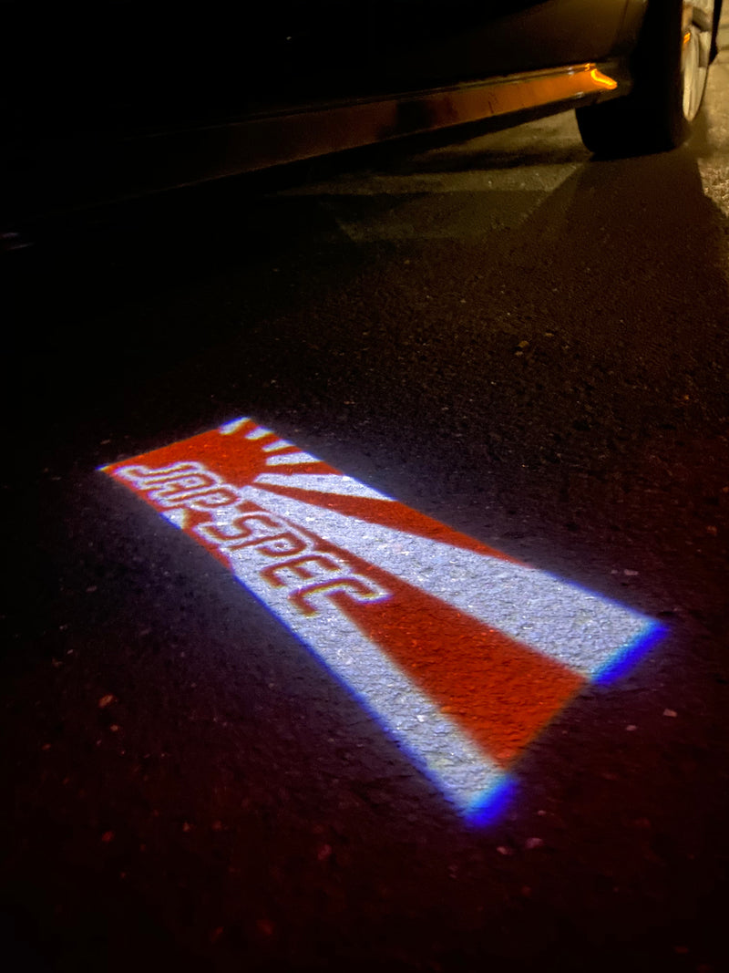 JDM LOGO PROJECTOT LIGHTS Nr.13 (quantità 1 = 1 set/2 luci per porta) 