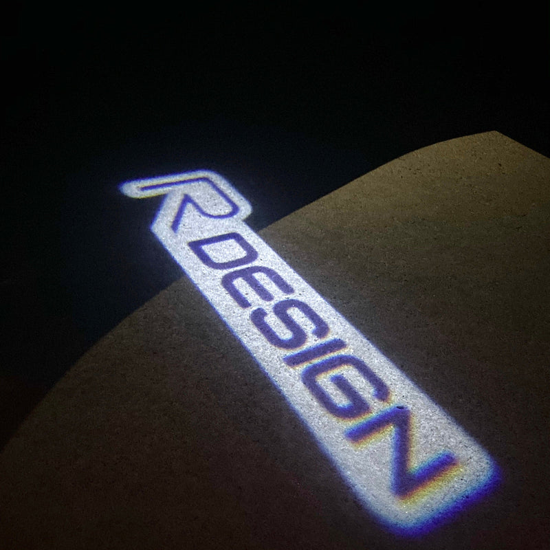 Volvo R DESIGN LOGO PROJECROTR LIGHTS Nr.59 (Menge 1 = 2 Logofolie / 2 Türleuchten) 