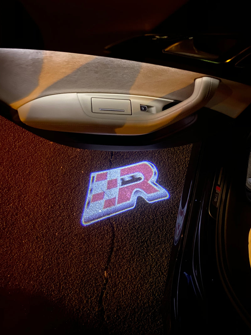 Volkswagen Luci porta R Logo Nr. 149 (quantità 1 = 2 pellicole logo / 2 luci porta)