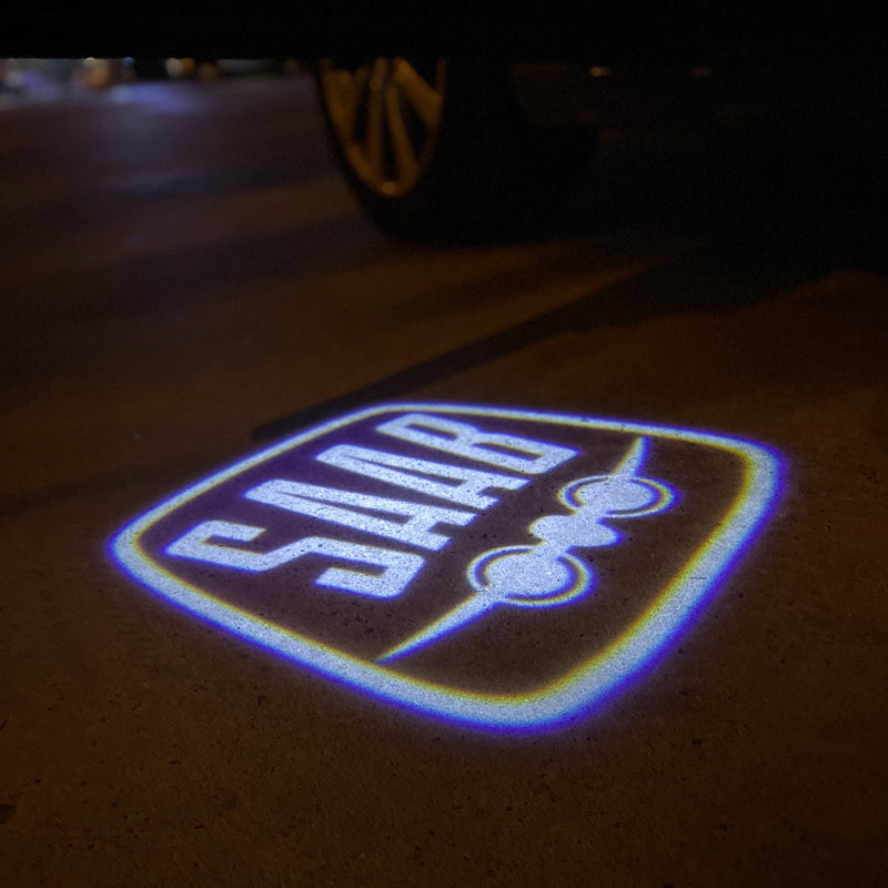 SAAB Original LOGO PROJECROTR LIGHTS Nr.2514 (Menge 1 = 1 Satz/2 Türleuchten)