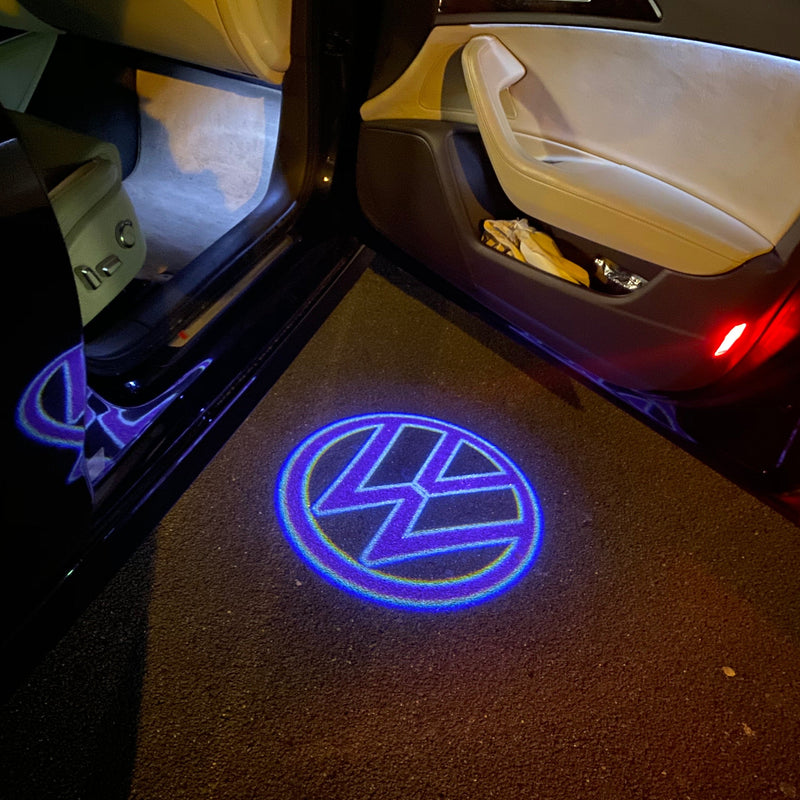 Volkswagen Luci porta Logo originale n. 161 (quantità 1 = 2 pellicole logo / 2 luci porta)