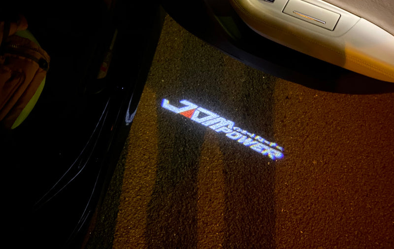 JDM LOGO PROJECTOT LIGHTS Nr.23 (quantità 1 = 1 set/2 luci per porta) 