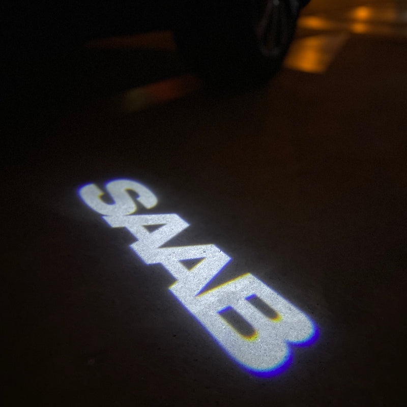 SAAB Original LOGO PROJECROTR LIGHTS Nr.2508 (quantità 1 = 1 set/2 luci porta)