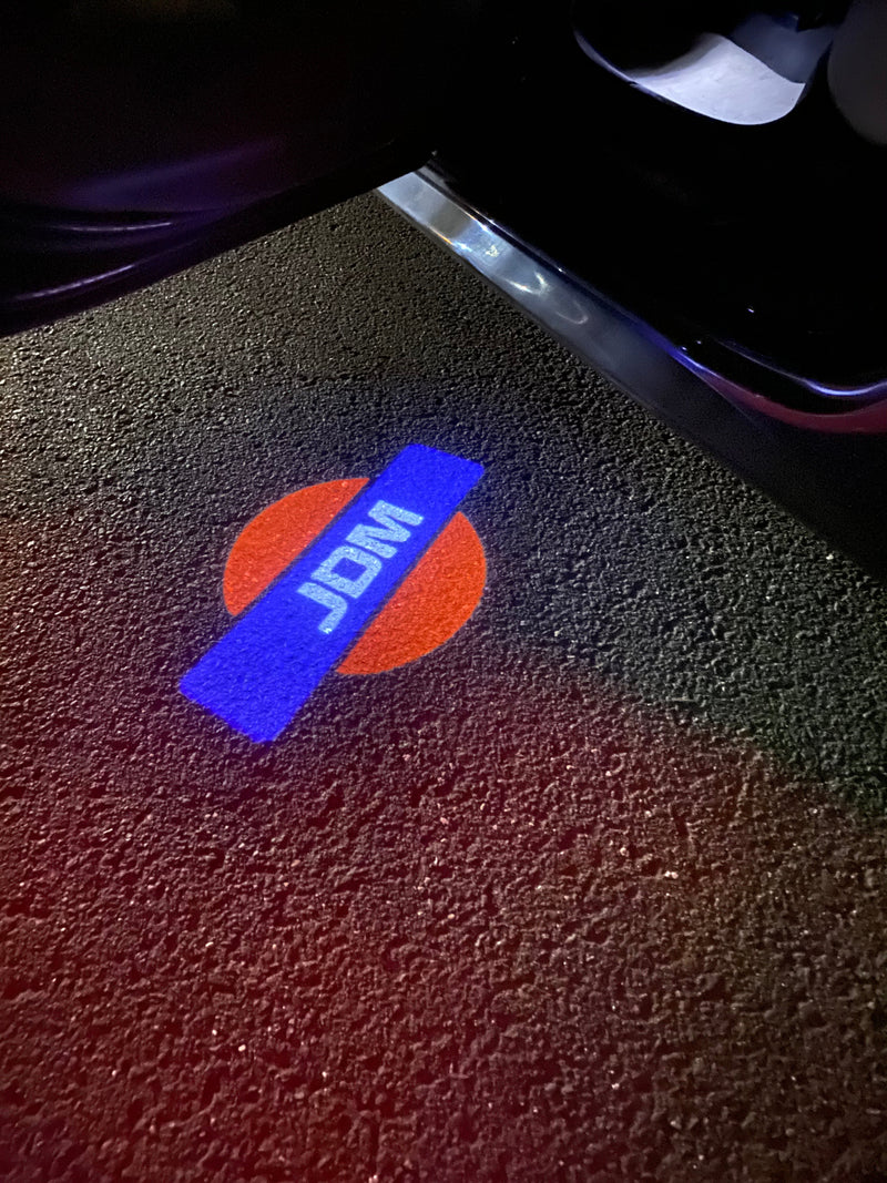 JDM LOGO PROJECTOT LIGHTS Nr.15 (quantità 1 = 1 set/2 luci per porta) 