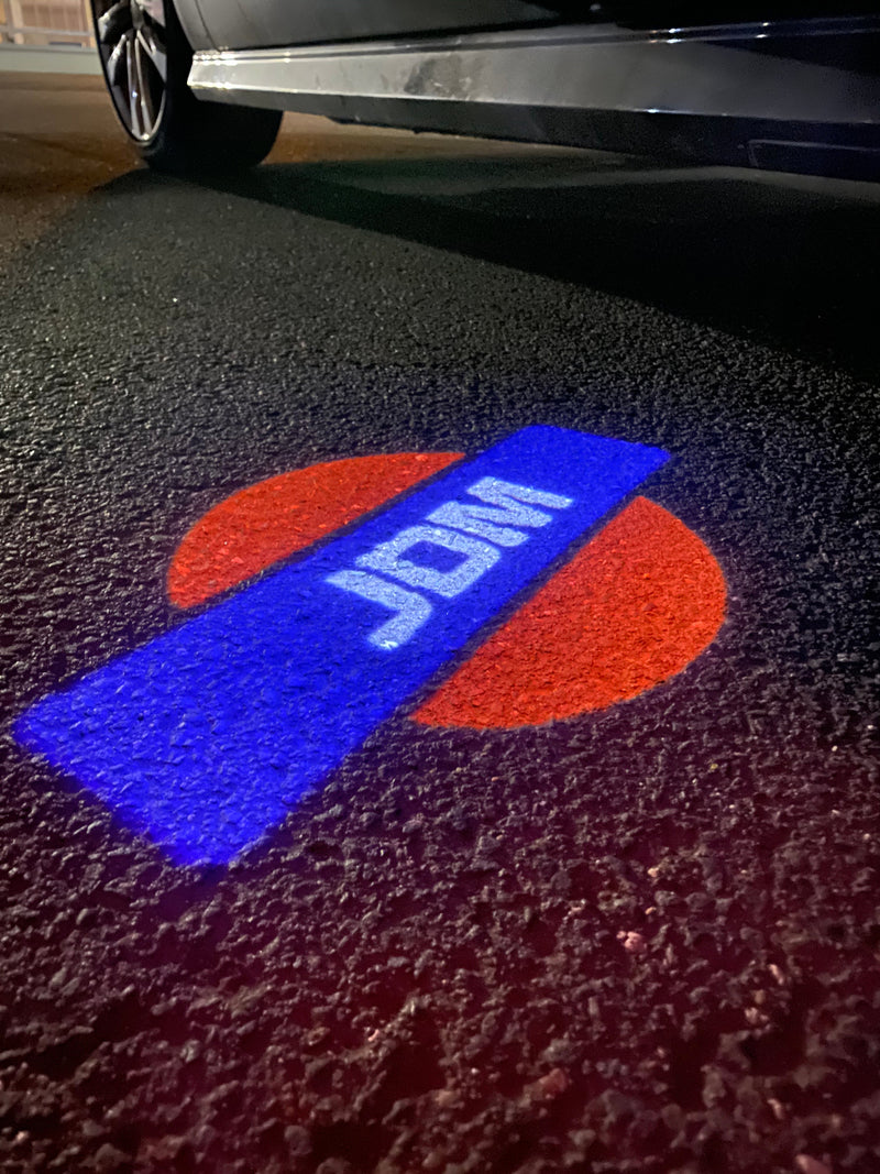 JDM LOGO PROJECTOT LIGHTS Nr.15 (quantità 1 = 1 set/2 luci per porta) 