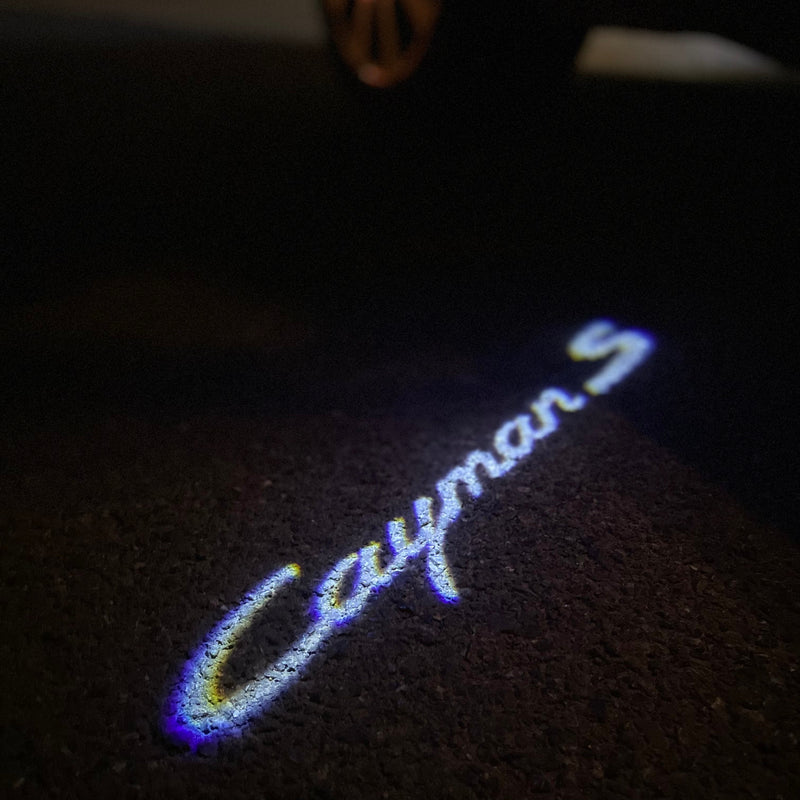 PORSCHE Cayman LOGO PROJECTOT LIGHTS Nr.8011 (quantità 1 = 2 pellicole logo / 2 luci porta)