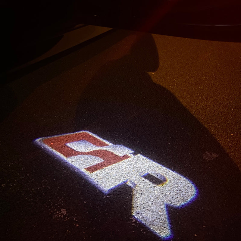 Volkswagen Luci porta R Logo Nr. 166 (quantità 1 = 2 pellicole logo / 2 luci porta)