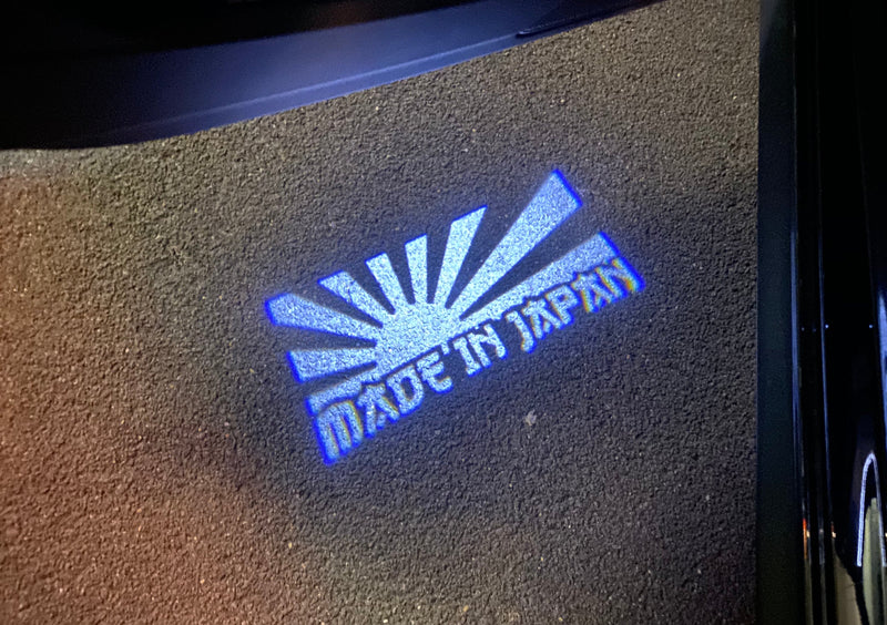 JDM LOGO PROJECTOT LIGHTS Nr.26 (quantità 1 = 1 set/2 luci per porta) 