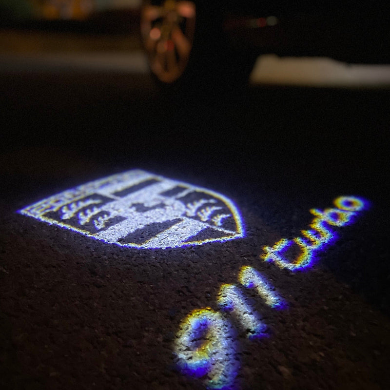 PORSCHE 911 LOGO PROJECTOT LIGHTS Nr.81 (quantità 1 = 2 pellicole logo / 2 luci porta) 