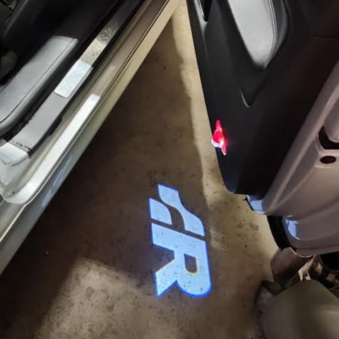 Volkswagen Luci porta R Logo Nr. 156 (quantità 1 = 2 pellicole logo / 2 luci porta)