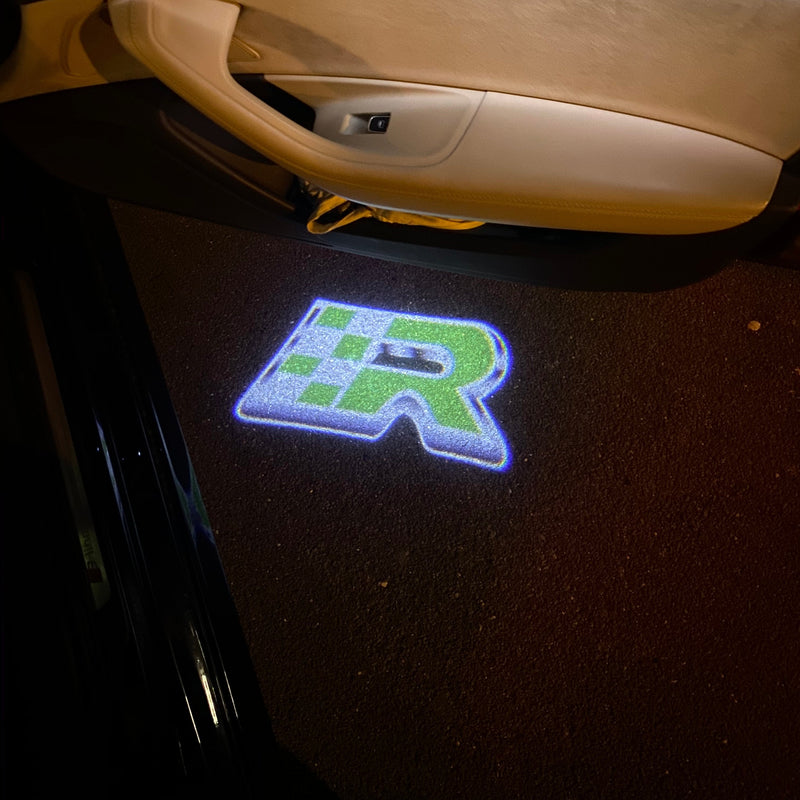 Volkswagen Luci porta R Logo Nr. 148 (quantità 1 = 2 pellicole logo / 2 luci porta)