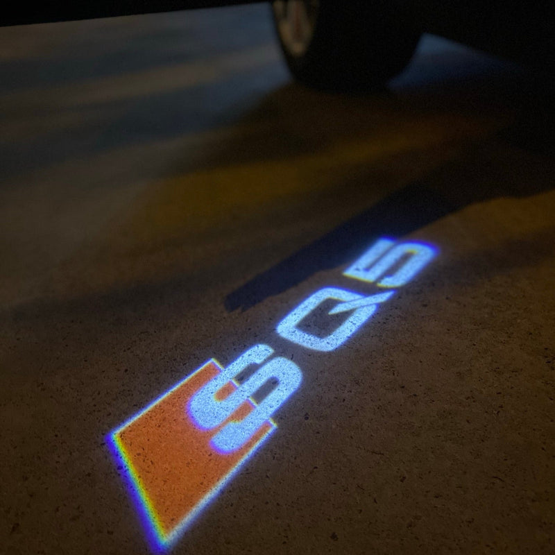 AUDI SQ5 LOGO PROJECTOT LIGHTS Nr.58 (quantità 1 = 2 pellicole logo /2 luci porta） 